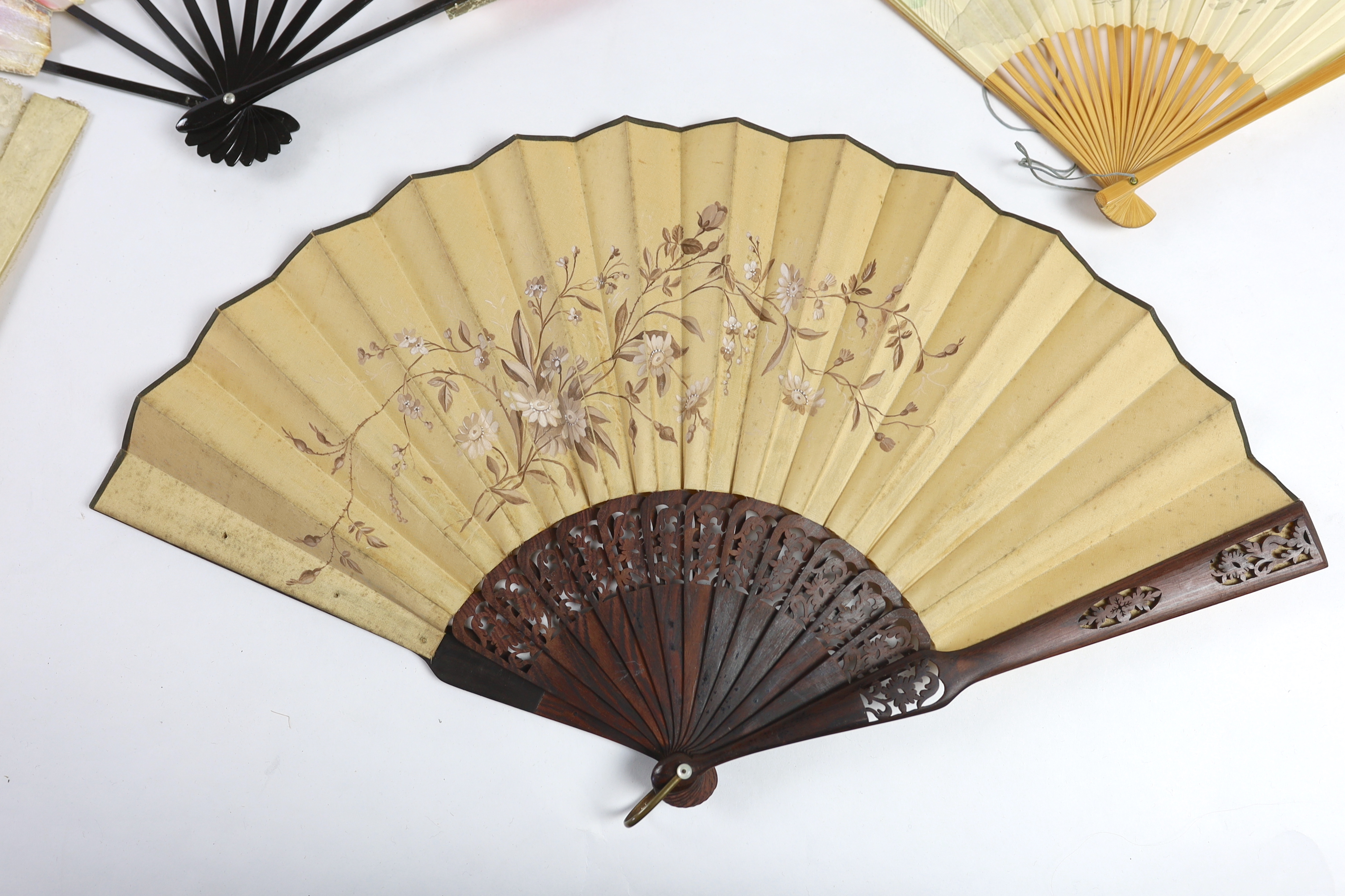 A collection of 19th and 20th century mostly paper fans, ten in reasonable condition useful for stage and film (16)